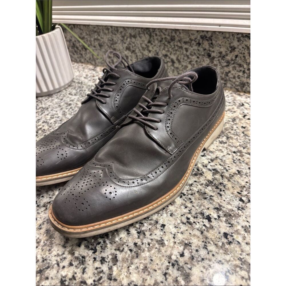 Unlisted by Kenneth Cole Men's Black Leather Wingtip Oxfords with Tan Welt